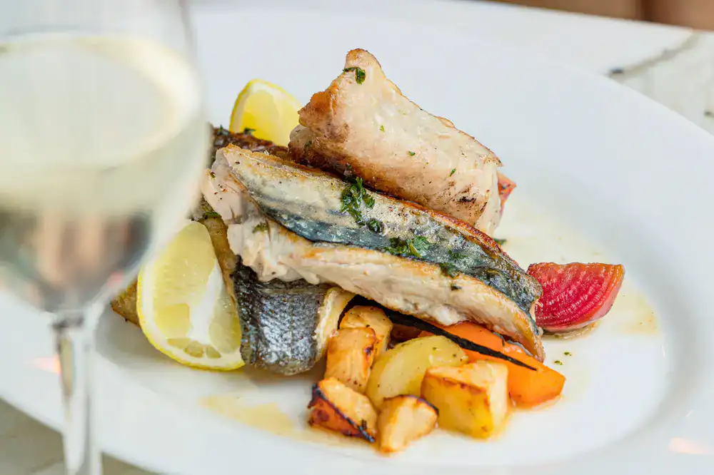 Pan roasted white fish fillet with herbs and lemon